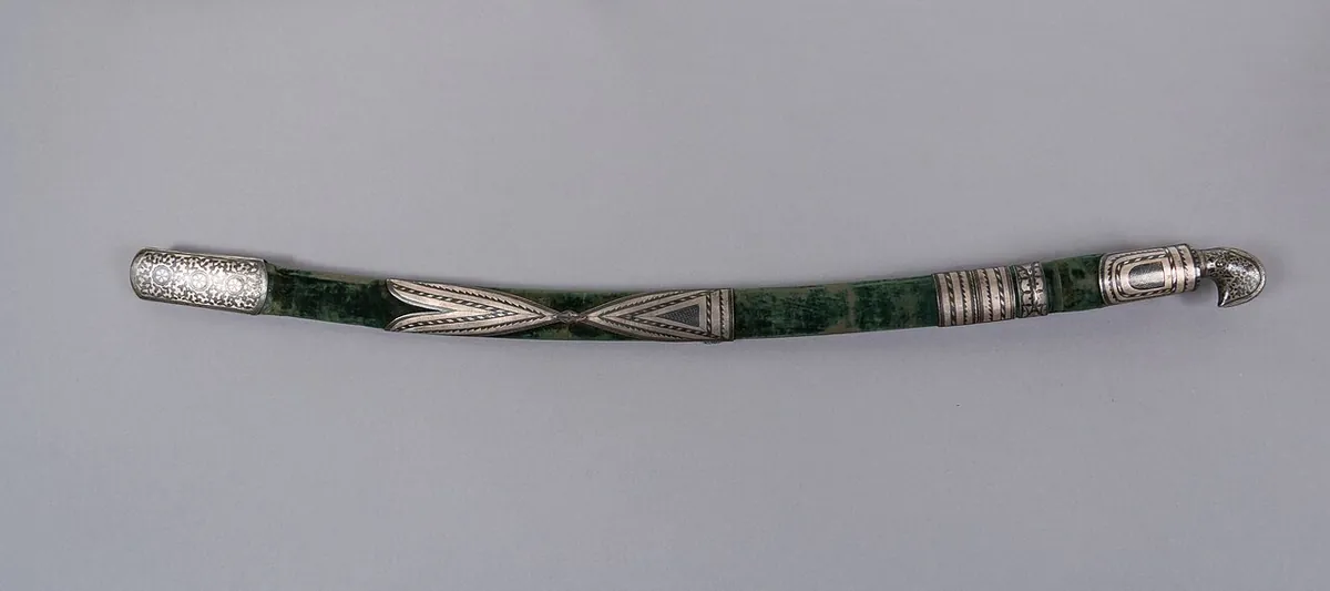A shashka in a green velvet scabbard with silver and niello mounts
