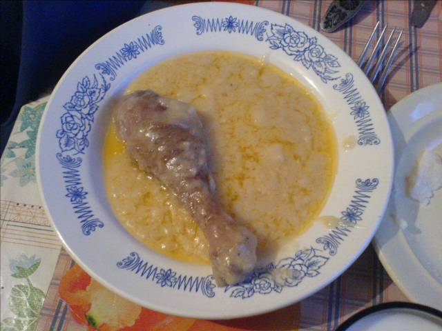 Circassian libzhe chicken with paste cornmeal porridge, traditional Adyghe meal